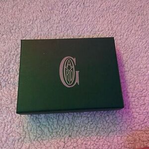 Green Box with Silver Logo